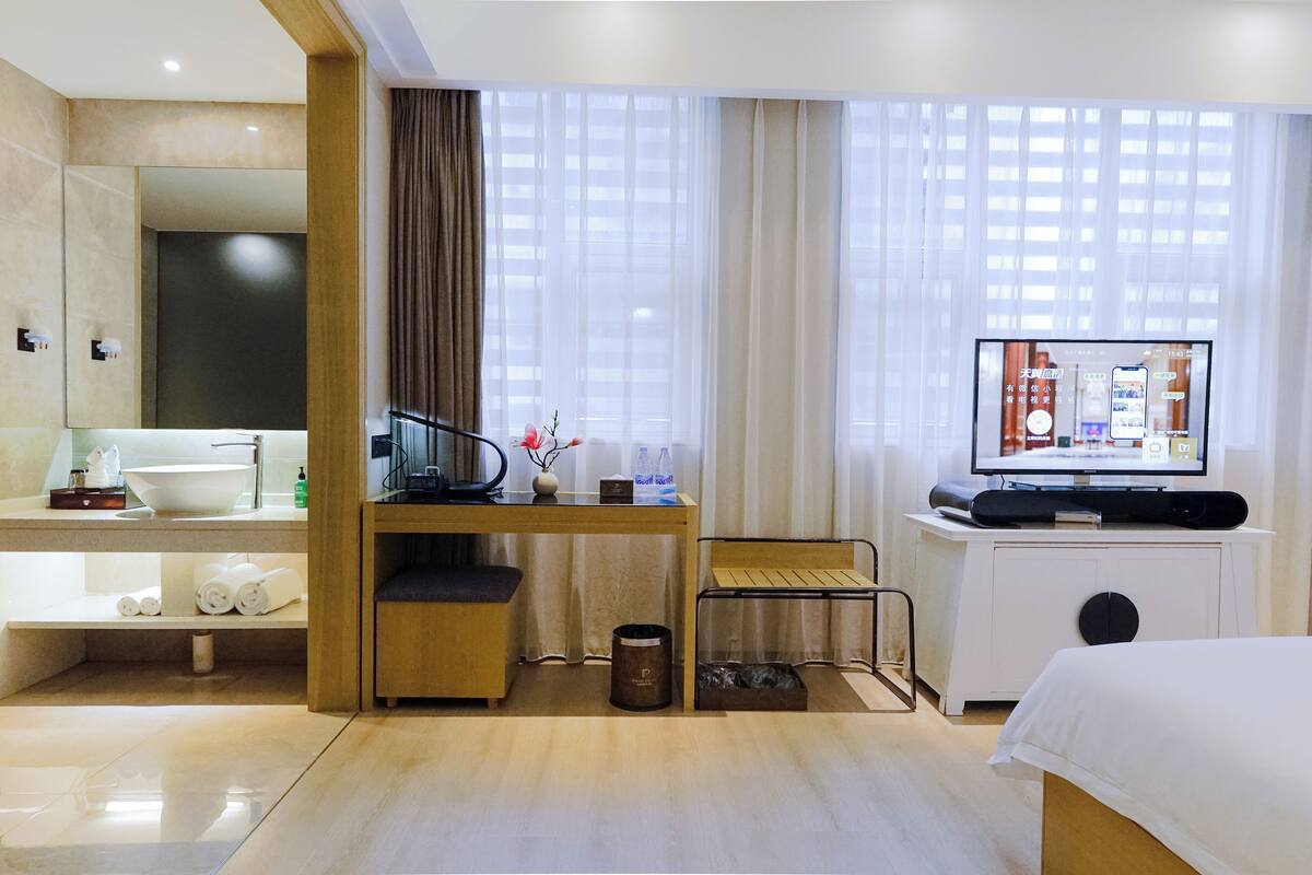 Premium bedding, down duvets, memory-foam beds, in-room safe