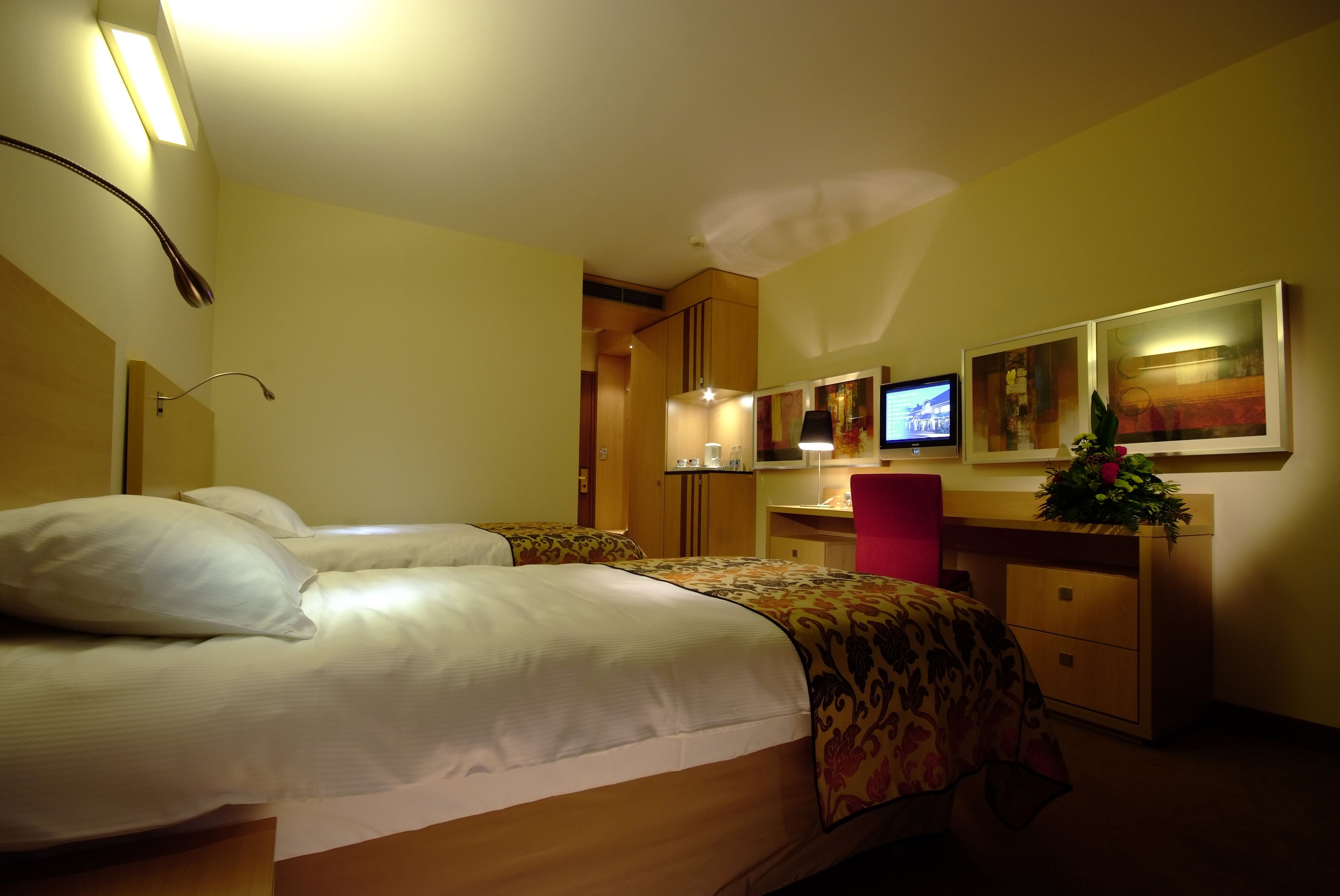 hypo-allergenic bedding, down duvets, pillow-top beds, desk