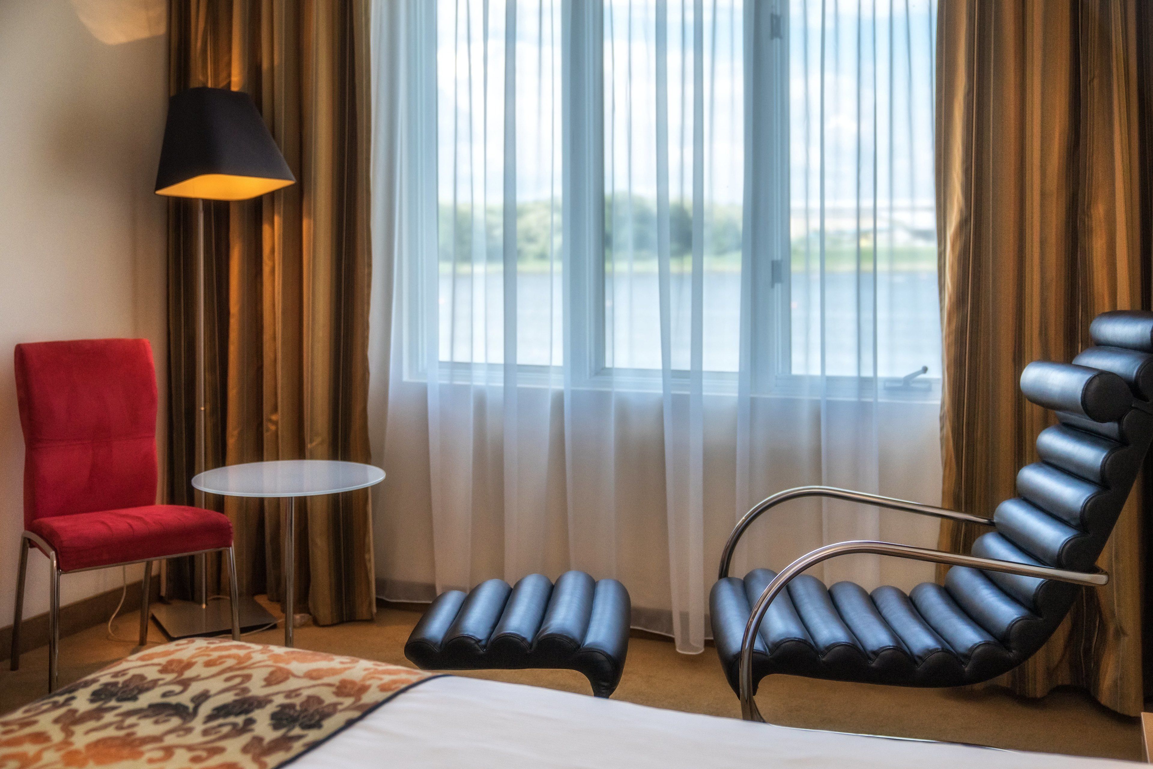 Superior Double Room, Lake View | Living area | 21-inch LCD TV with cable channels, TV