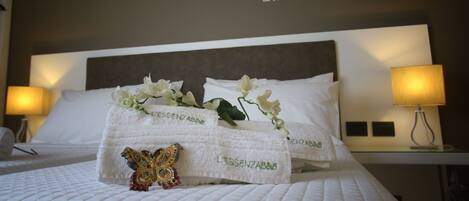 Sábanas italianas Frette, ropa de cama de alta calidad y minibar