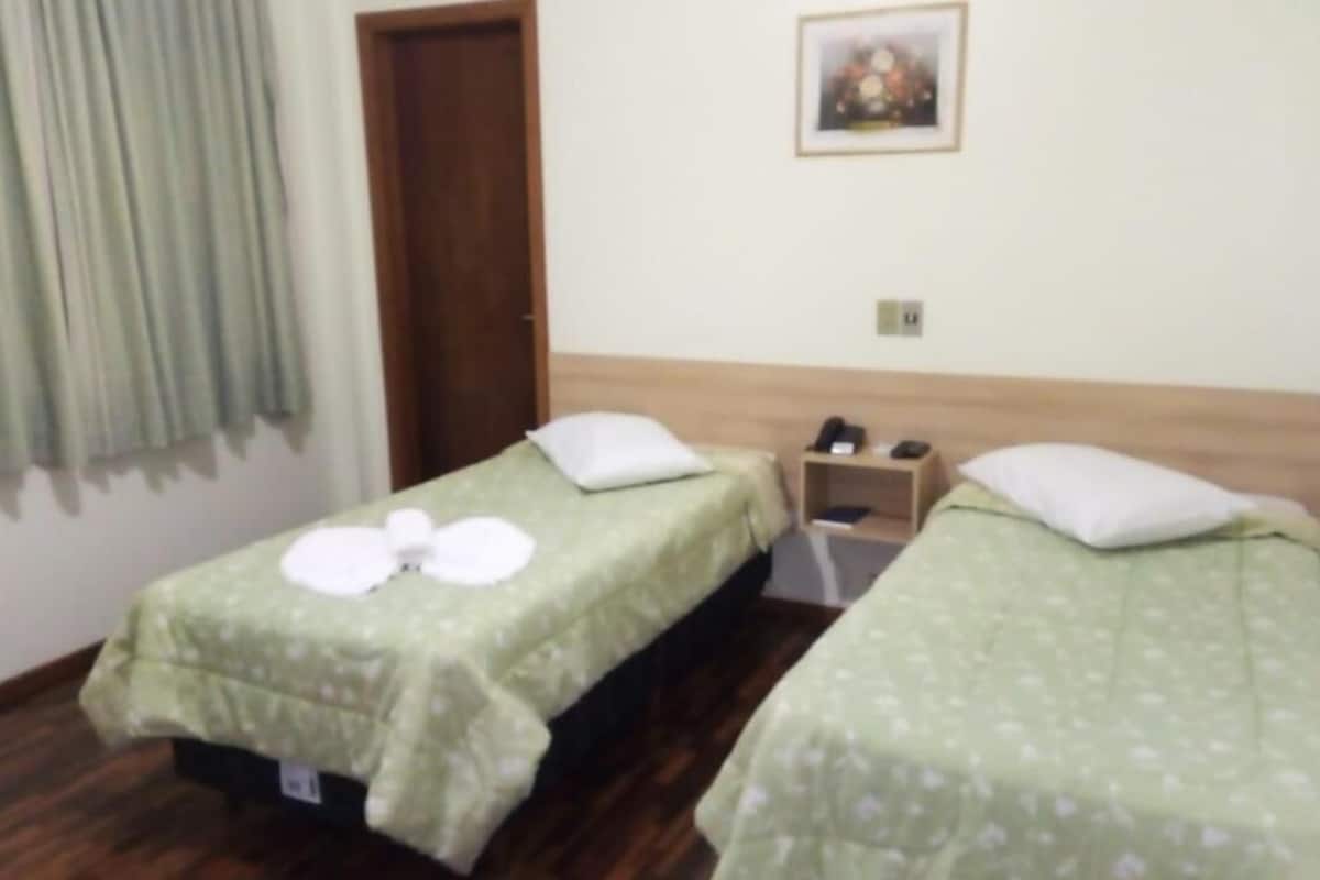 twin room | minibar, blackout curtains, iron/ironing board, free wifi