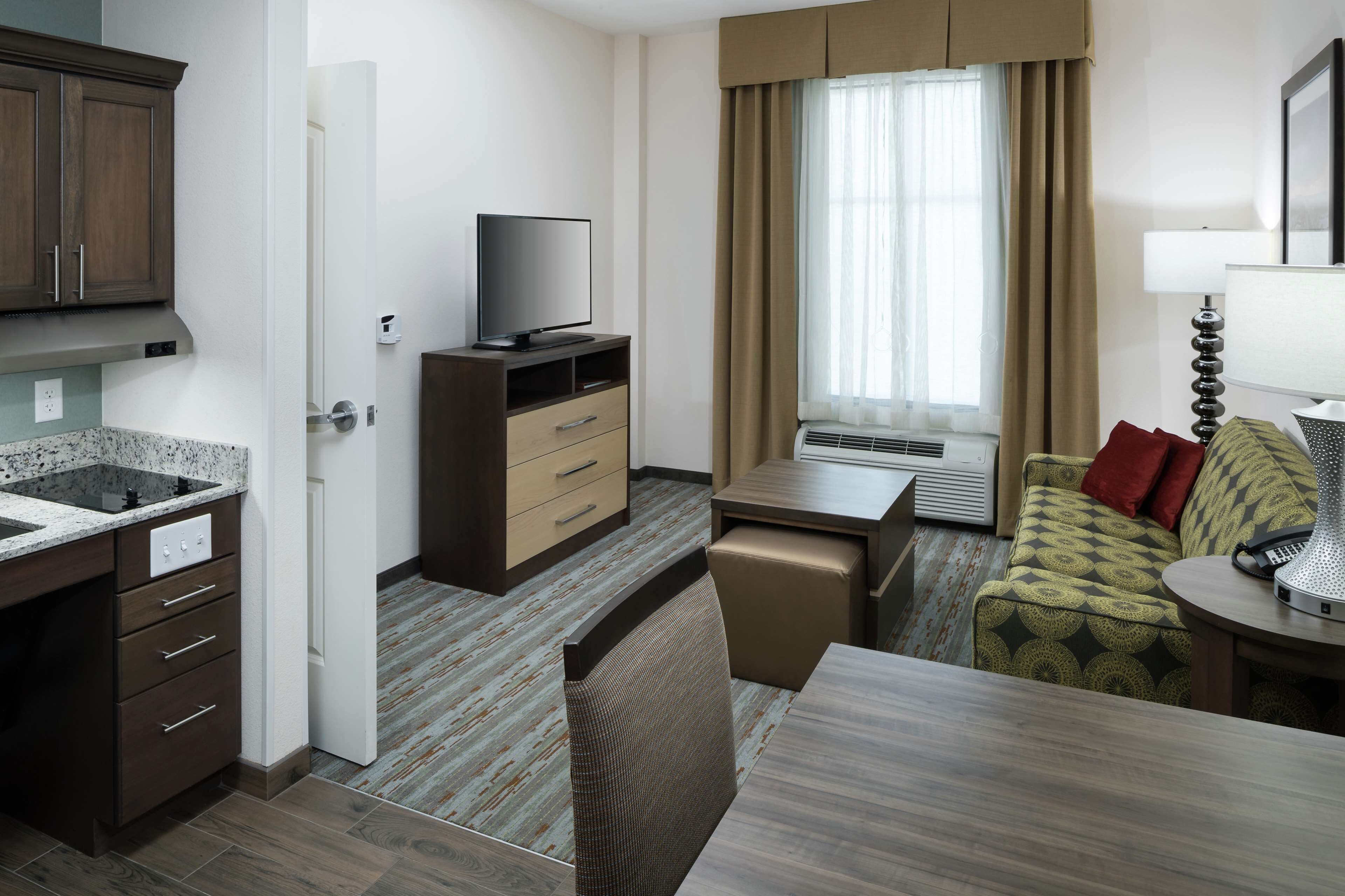 desk, laptop workspace, blackout curtains, free cots/infant beds