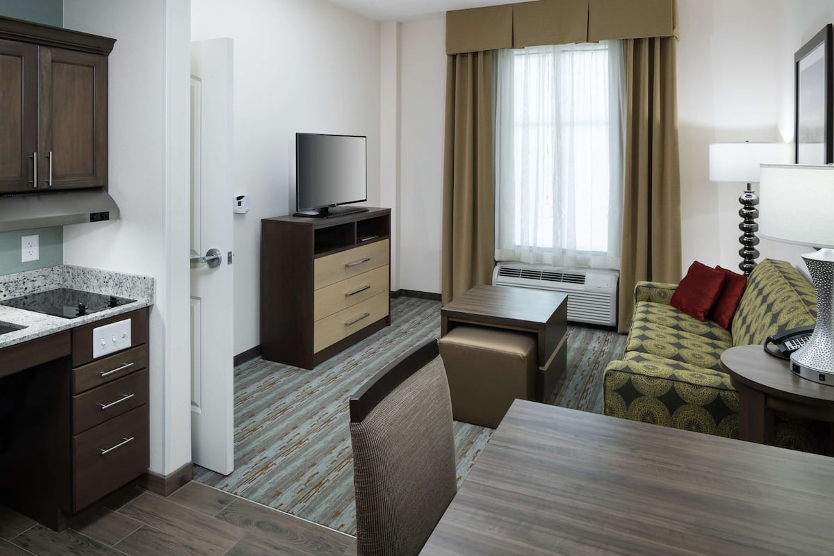 desk, laptop workspace, blackout curtains, free cots/infant beds