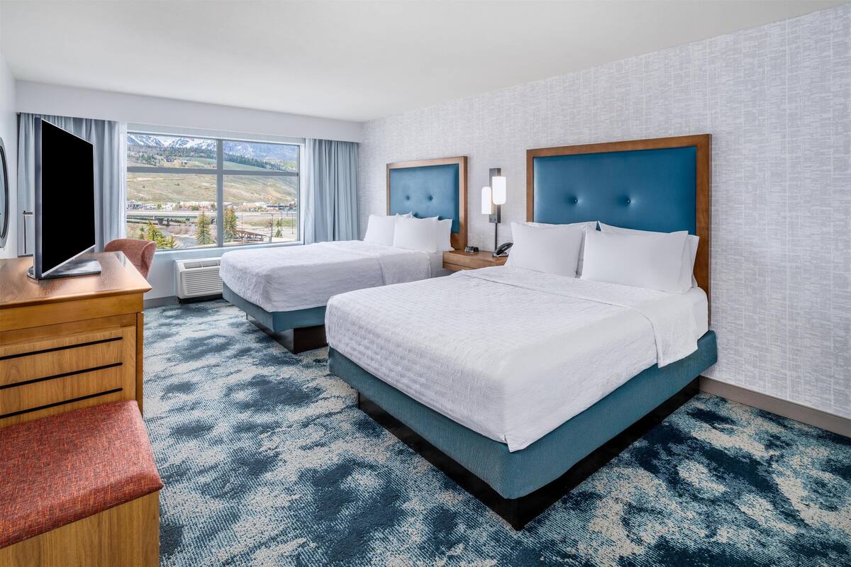 room, 2 queen beds, refrigerator, mountain view | blackout curtains, iron/ironing board, free wifi, bed sheets