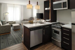Suite, 2 Bedrooms | In-room safe, desk, laptop workspace, iron/ironing board
