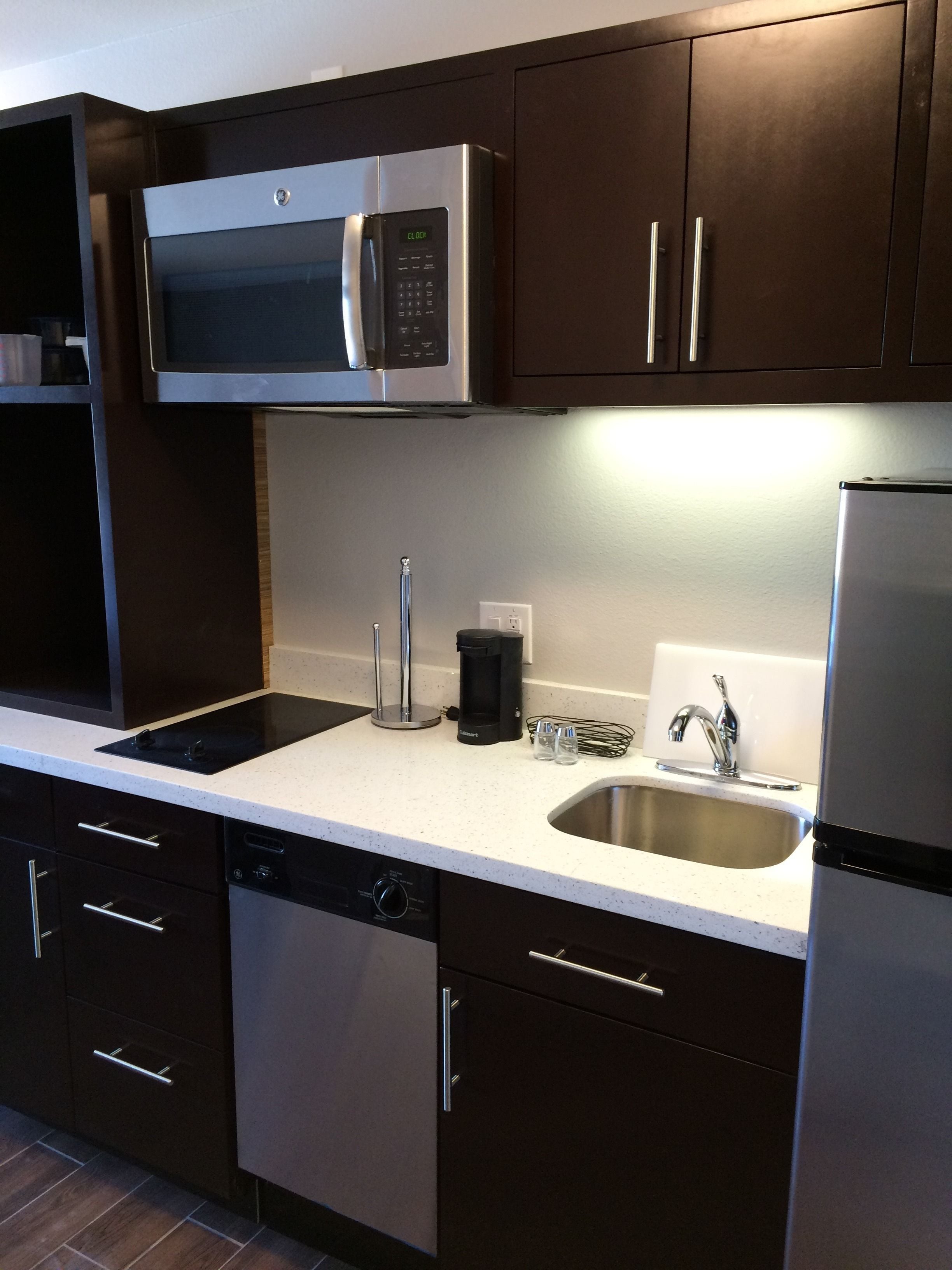 microwave, stovetop, dishwasher, coffee/tea maker