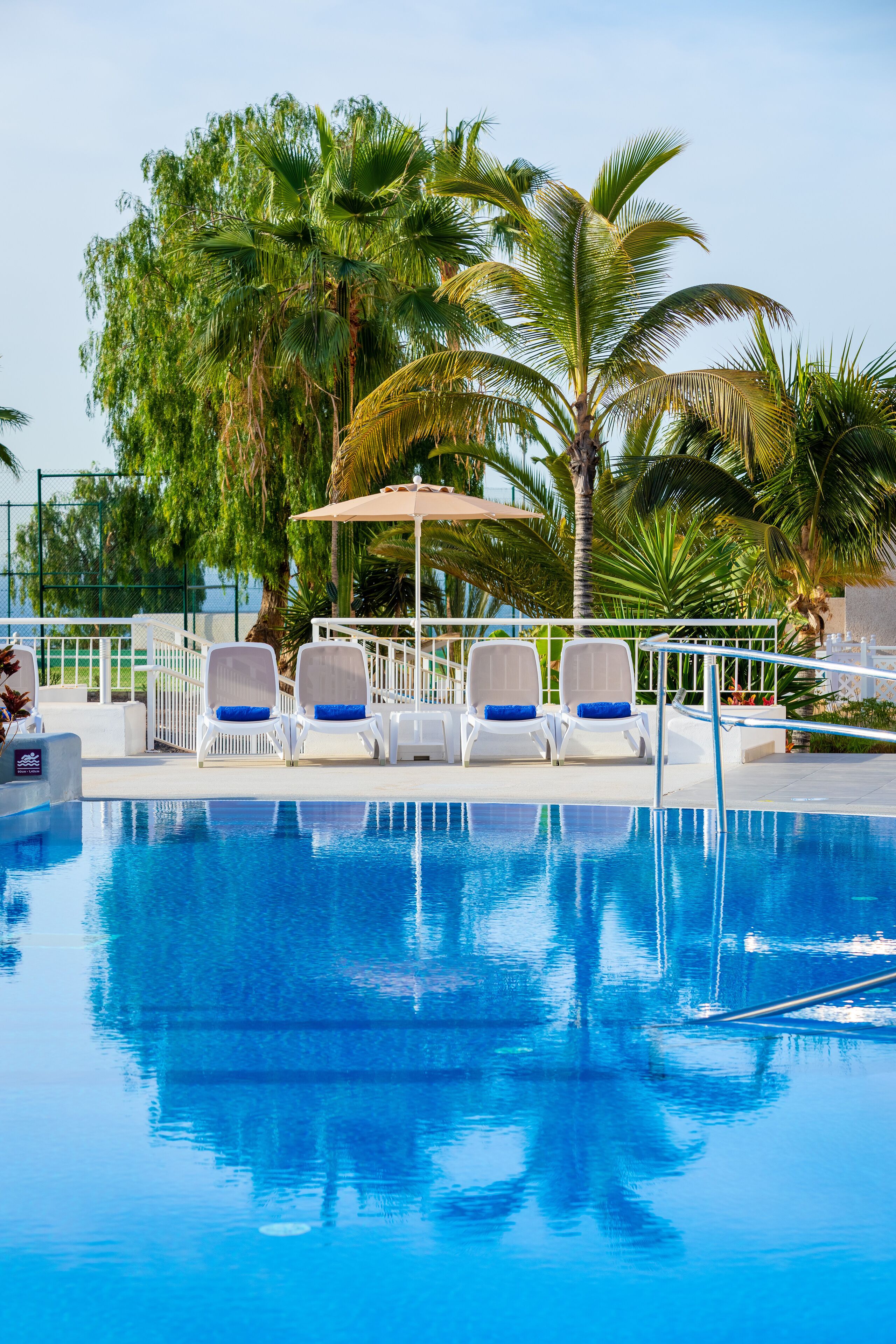 2 outdoor pools, open 9:00 am to 5:00 pm, pool umbrellas, pool loungers