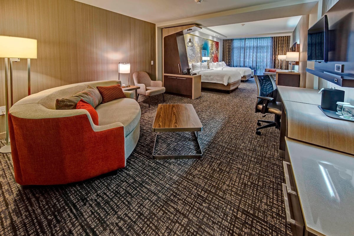 Suite, Multiple Beds, Non Smoking | Living area | Flat-screen TV