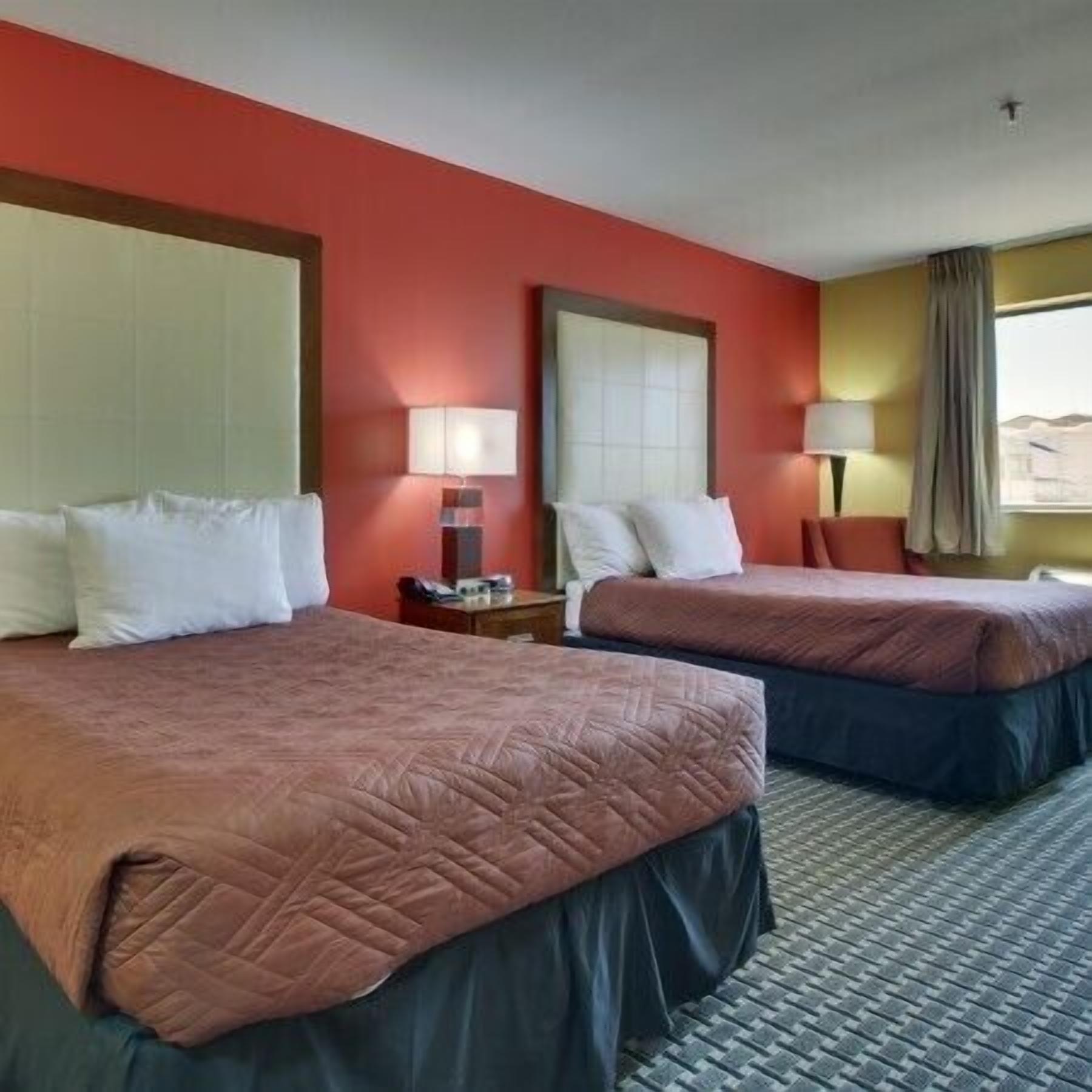 room, 2 double beds | desk, blackout curtains, iron/ironing board, free wifi