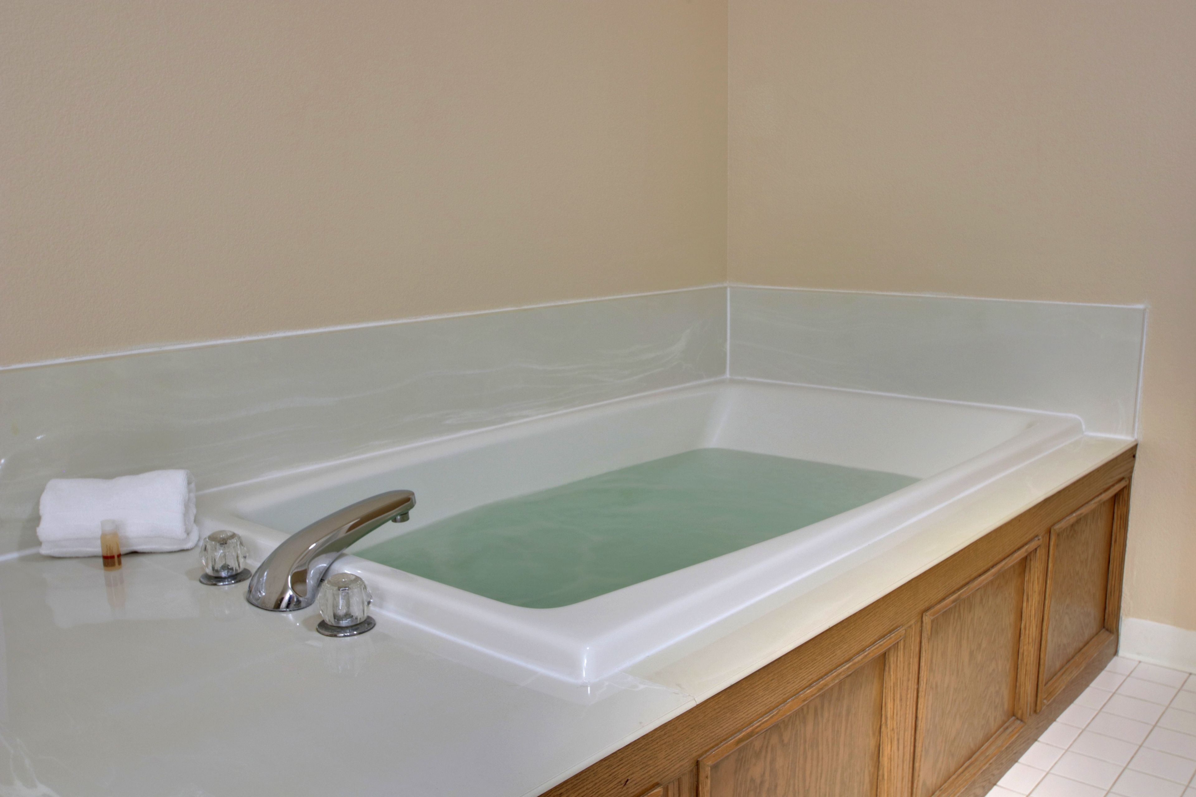 presidential suite, 1 king bed with sofa bed, jetted tub | deep-soaking bathtub