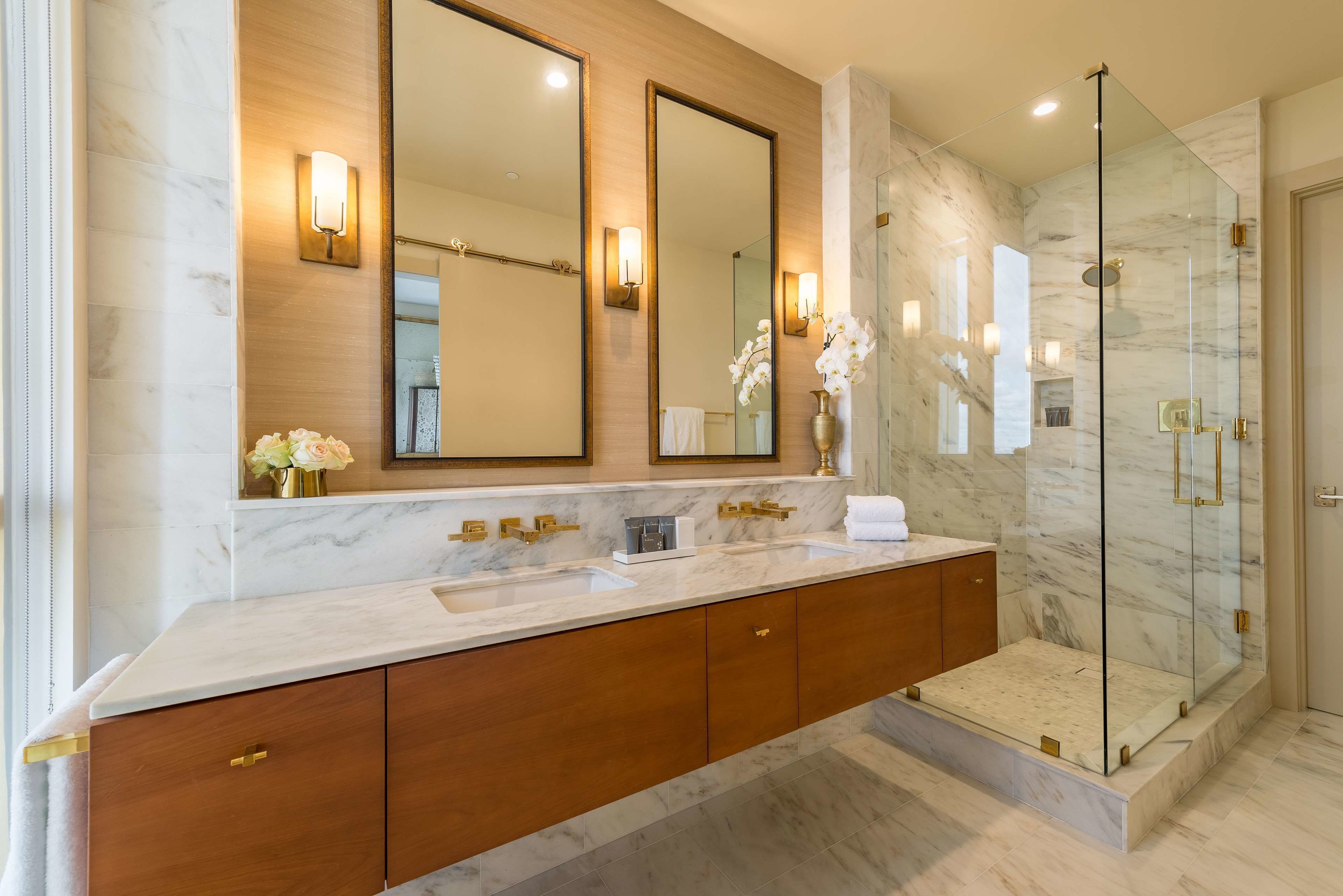 designer toiletries, hair dryer, bathrobes, slippers