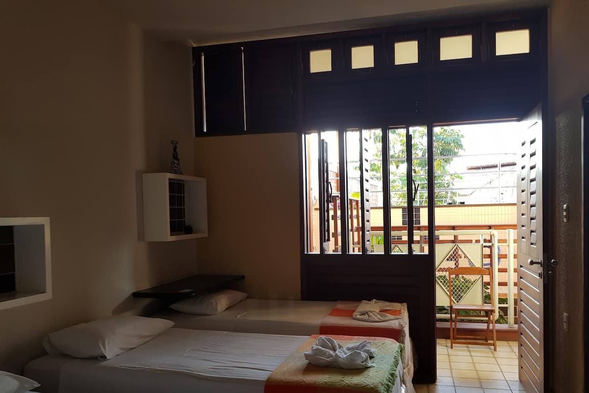 Luxury Quadruple Room, 1 Bedroom, Balcony, Pool View | Minibar, individually decorated, bed sheets