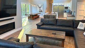 Grand Chalet, Private Pool, Mountain View | Living area | 85-inch flat-screen TV with digital channels, TV, fireplace