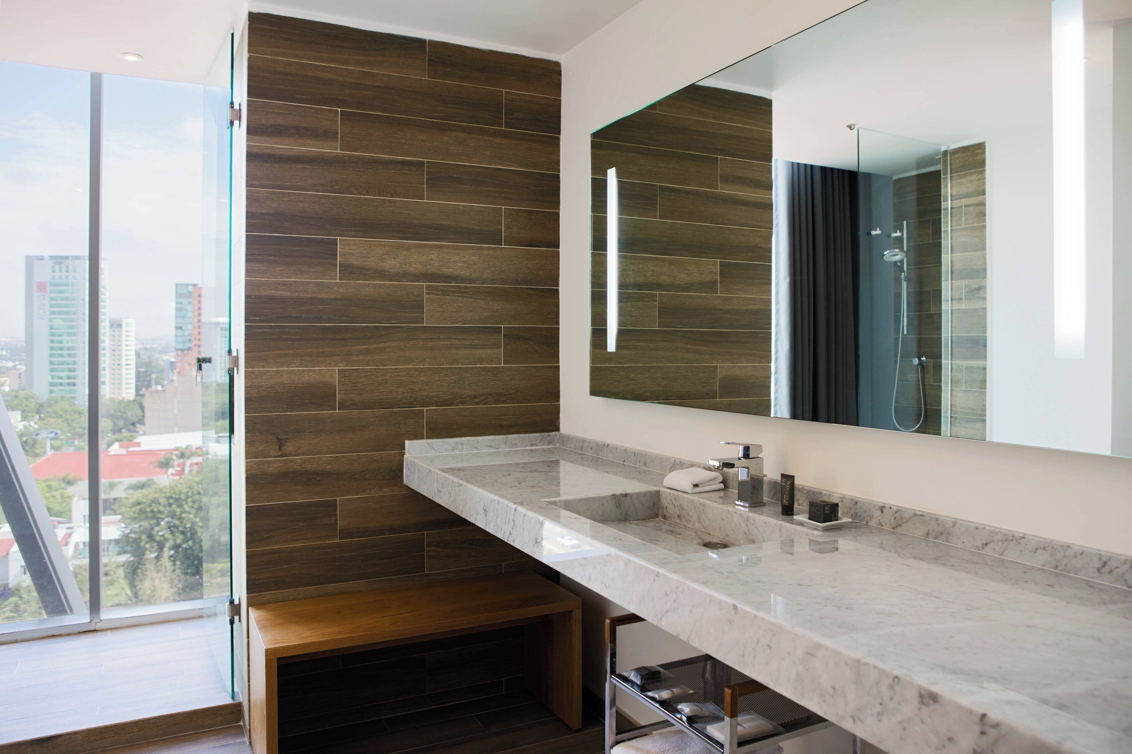 junior suite, 1 king bed, non smoking | bathroom | shower, free toiletries, hair dryer, towels