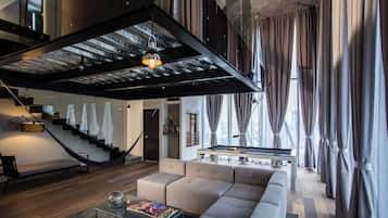 Suite, 1 King Bed (Bi-Level) | Living area | Flat-screen TV