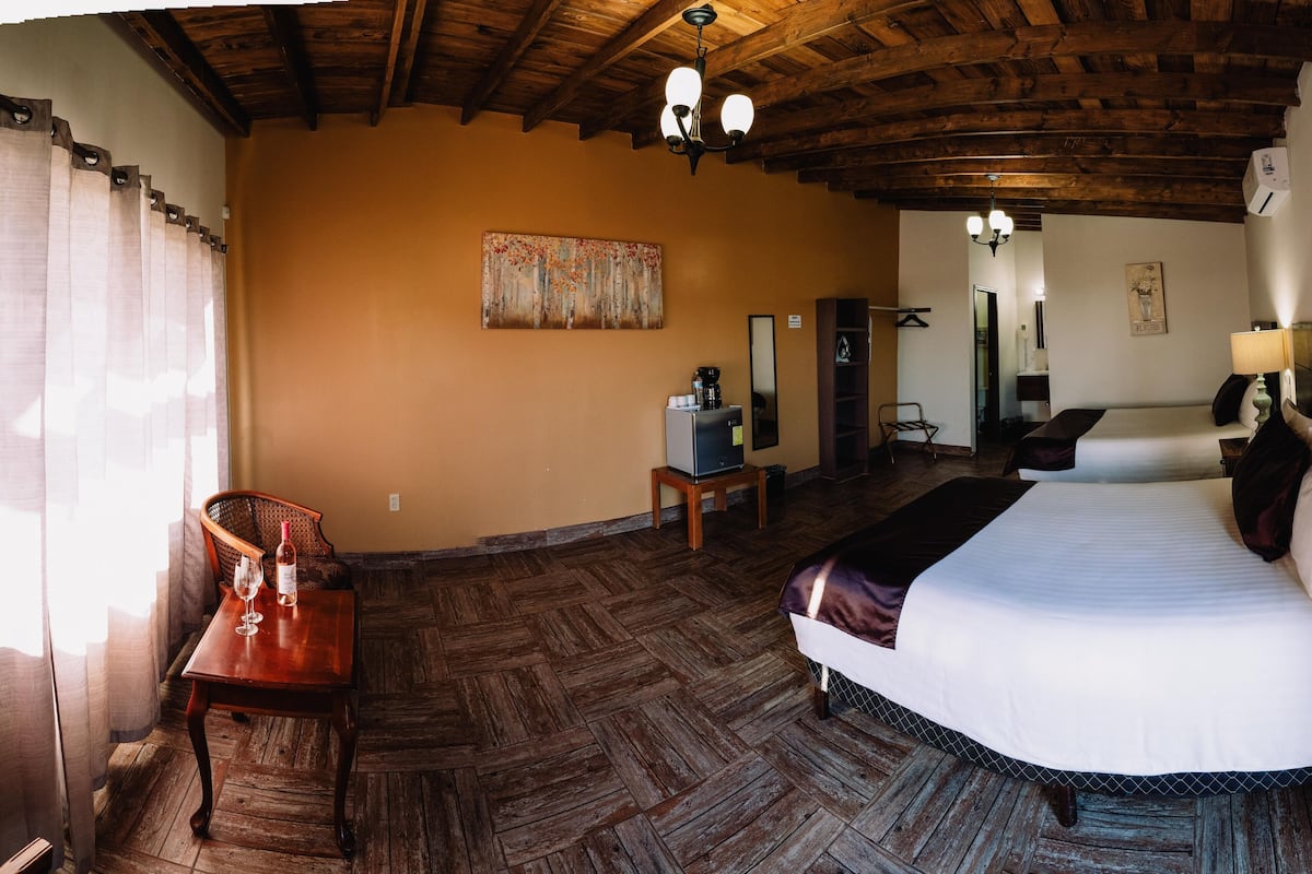 2 bedrooms, down comforters, minibar, individually decorated