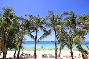On the beach, white sand, sun loungers - Bamboo Beach Resort (Boracay Island)