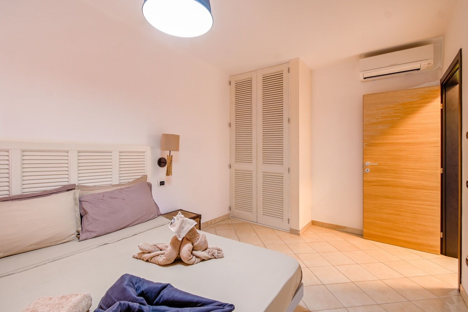 Apartamento superior | Roupas de cama premium, cofres nos quartos, individualmente mobiliados
