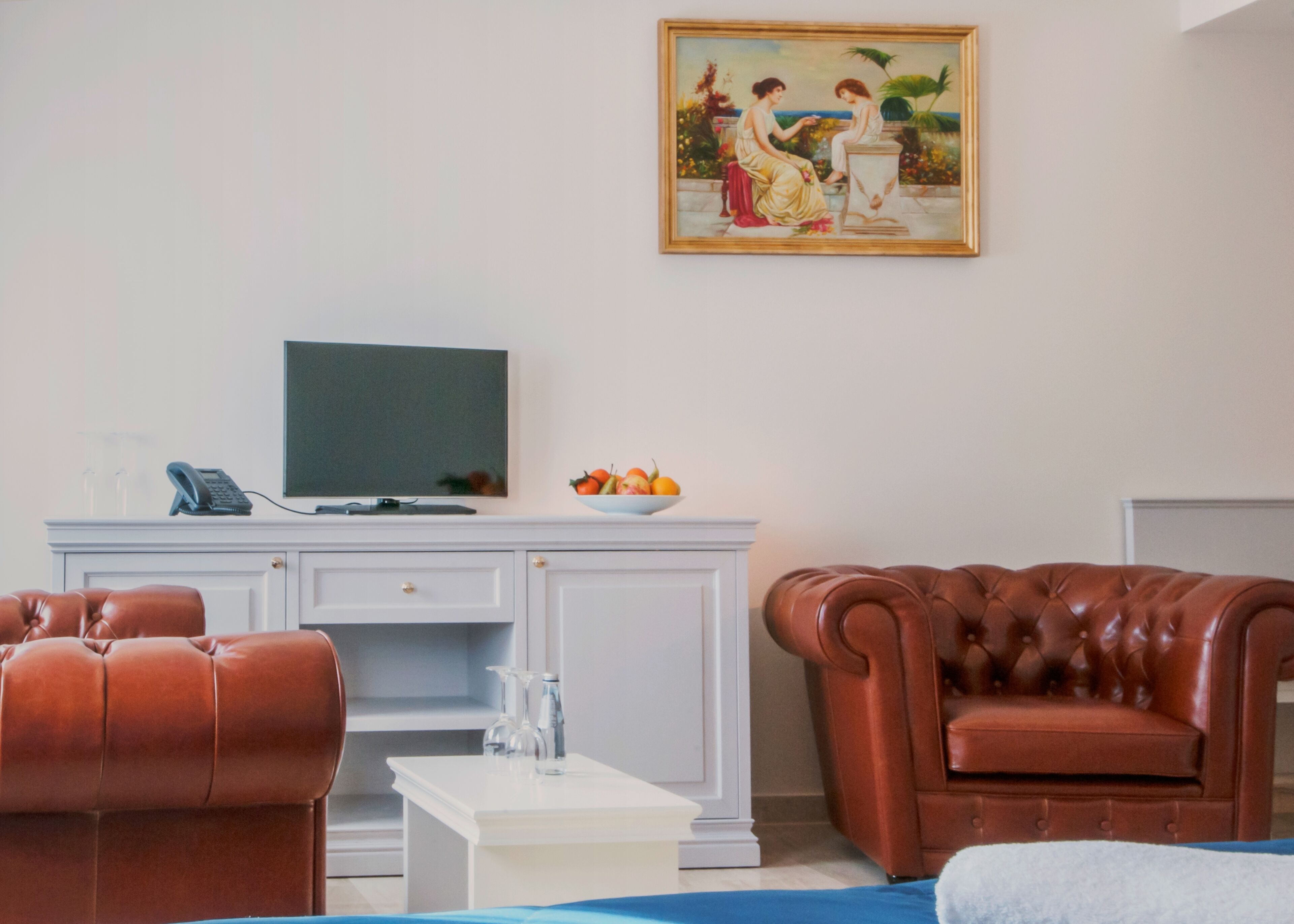 comfort double or twin room | living area | flat-screen tv, heated floors