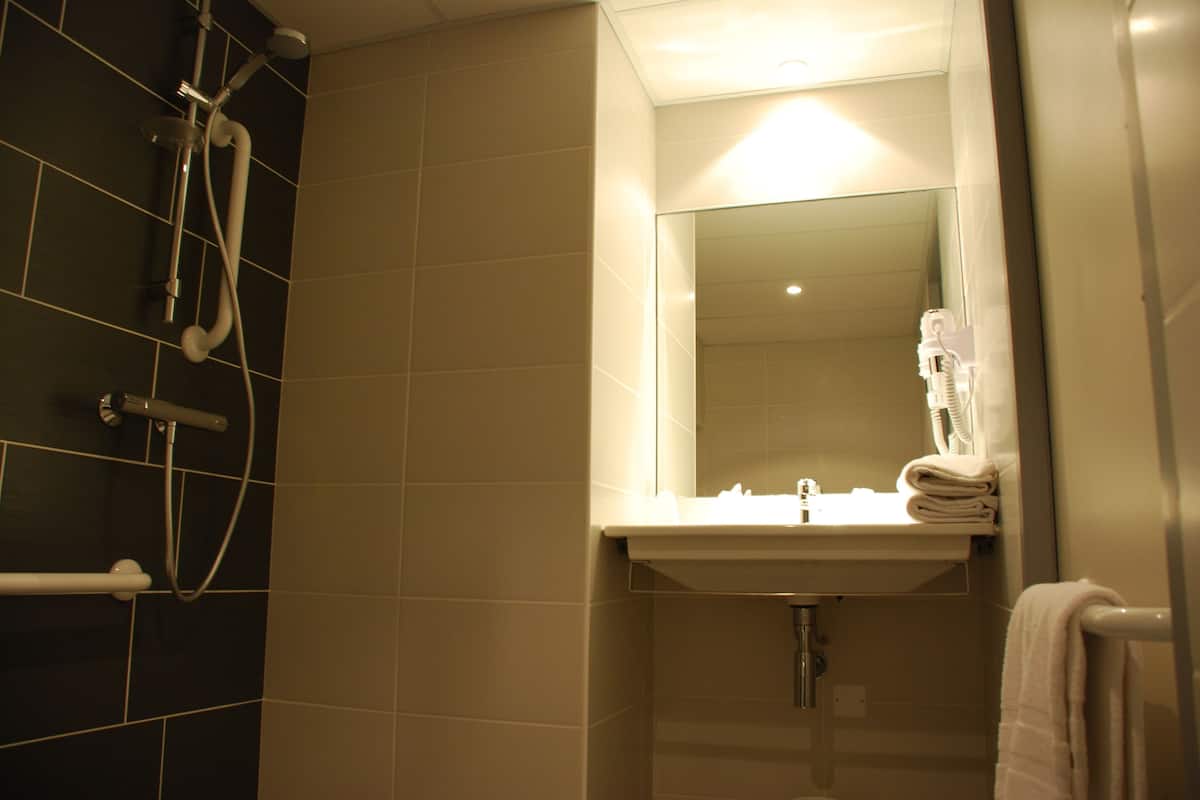 comfort triple room, accessible | bathroom | shower, free toiletries, hair dryer, towels