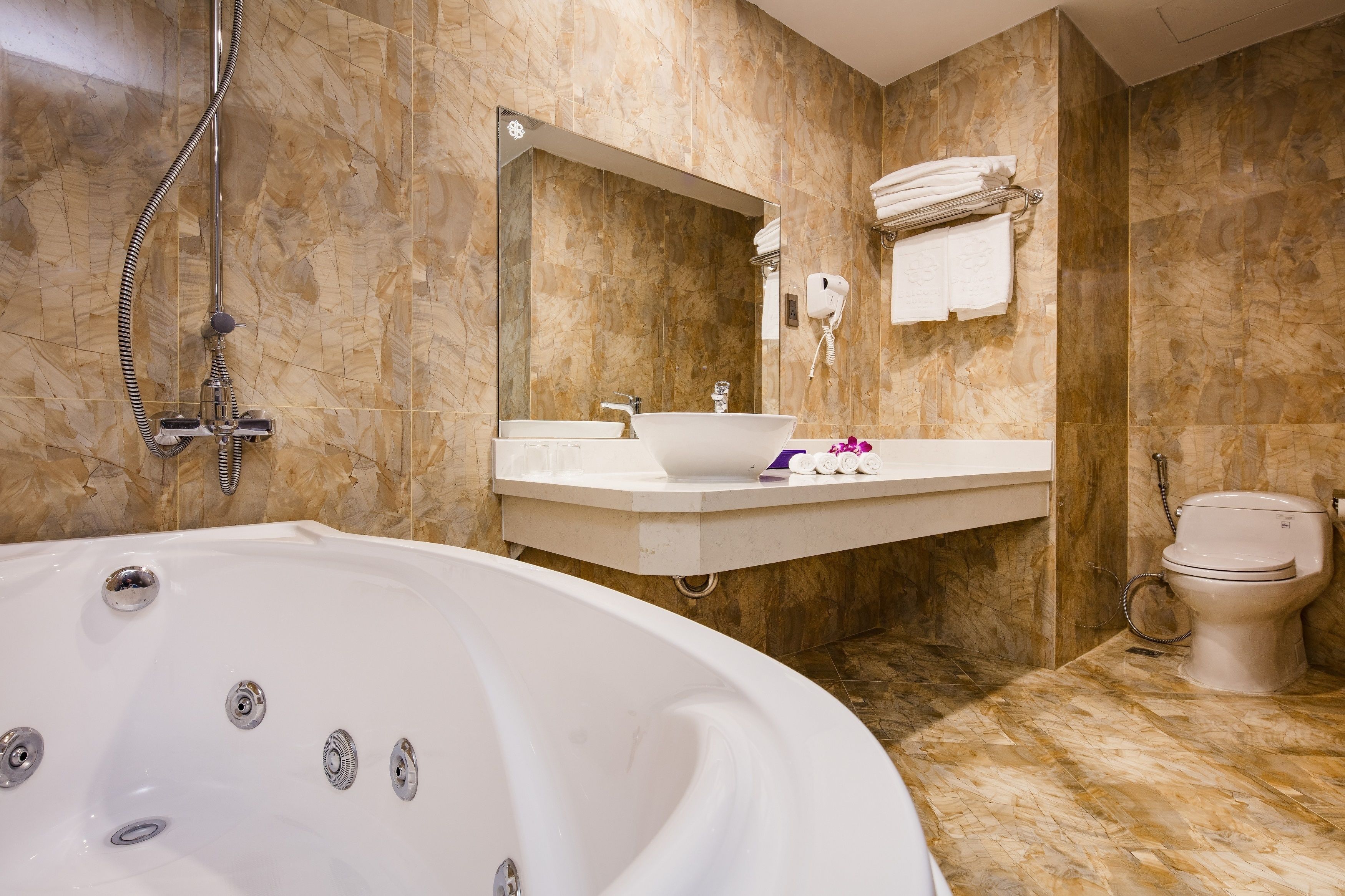 suite, 1 king bed, balcony, ocean view | bathroom | free toiletries, hair dryer, bathrobes, slippers