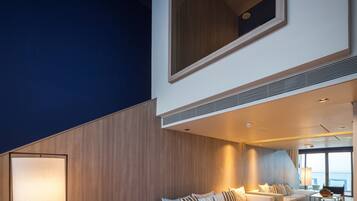 Villa, 1 King Bed (Sky Pool) | Living area | 55-inch Smart TV with cable channels, fireplace