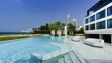 Outdoor pool, pool umbrellas, pool loungers