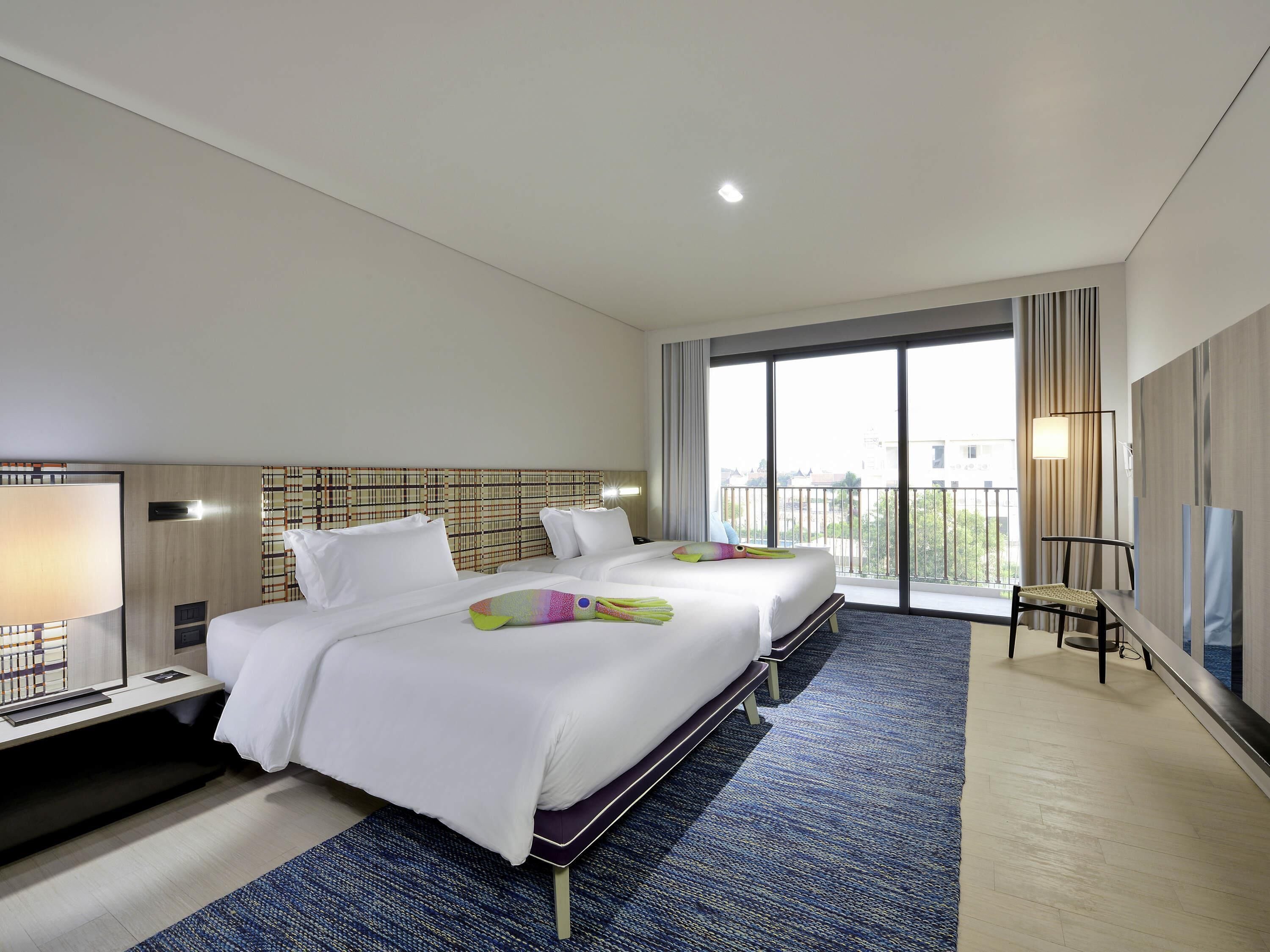 Kamar Twin, 2 Tempat Tidur Twin, pemandangan samudra (Seascape) | 1 kamar tidur, minibar, brankas, dan meja kerja