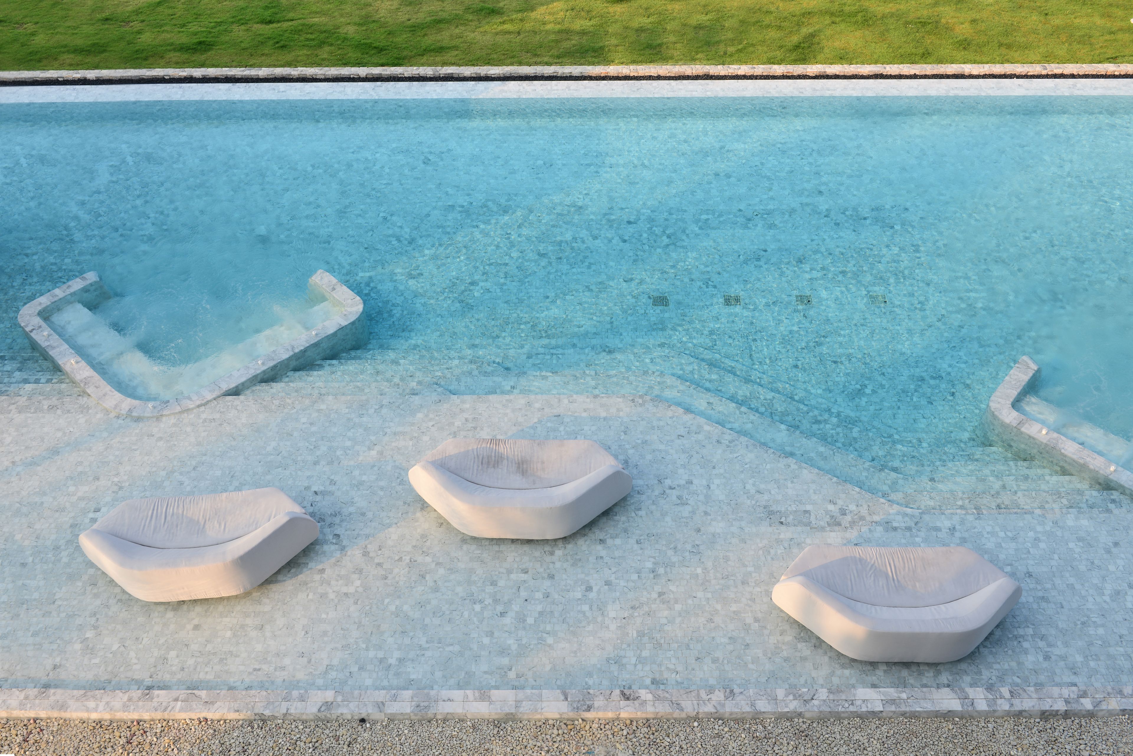 outdoor pool, pool umbrellas, pool loungers