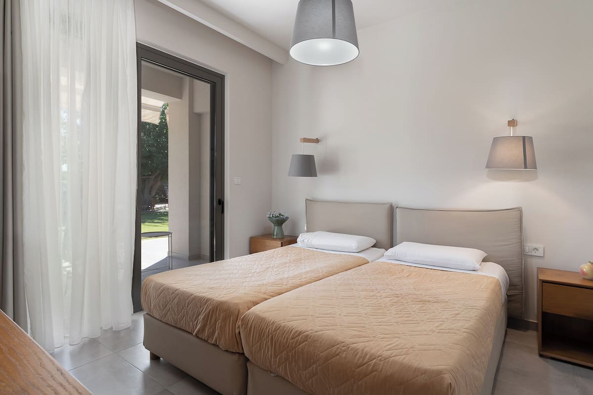 Superior Suite, 2 Bedrooms, Garden View | In-room safe, soundproofing, iron/ironing board, free cribs/infant beds
