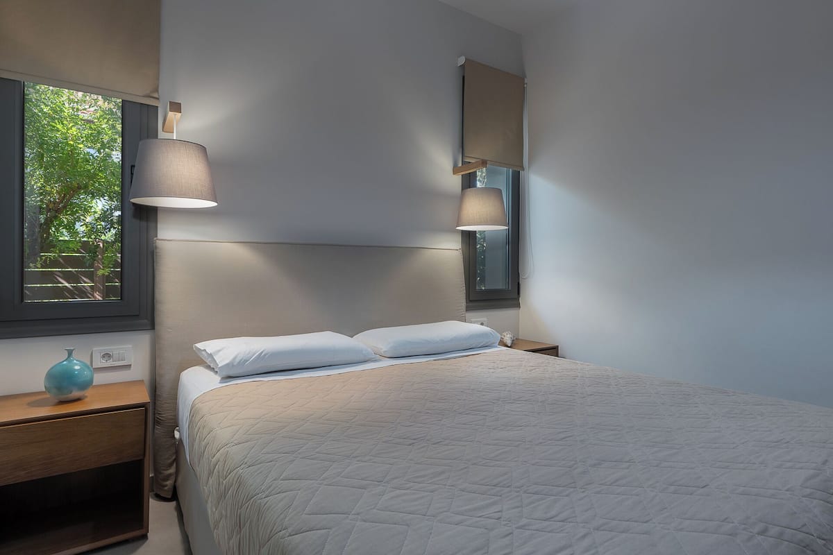 superior suite, 2 bedrooms, garden view | in-room safe, soundproofing, iron/ironing board, free cots/infant beds