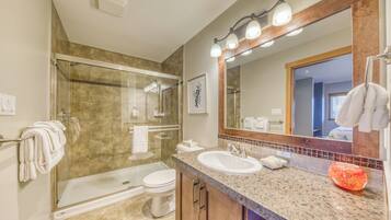 Luxury Townhome, 2 Bedrooms | Bathroom | Combined shower/tub, hair dryer, soap, toilet paper