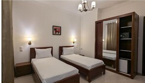 Chambre Standard avec lits jumeaux | Minibar, bureau, rideaux occultants, Wi-Fi gratuit