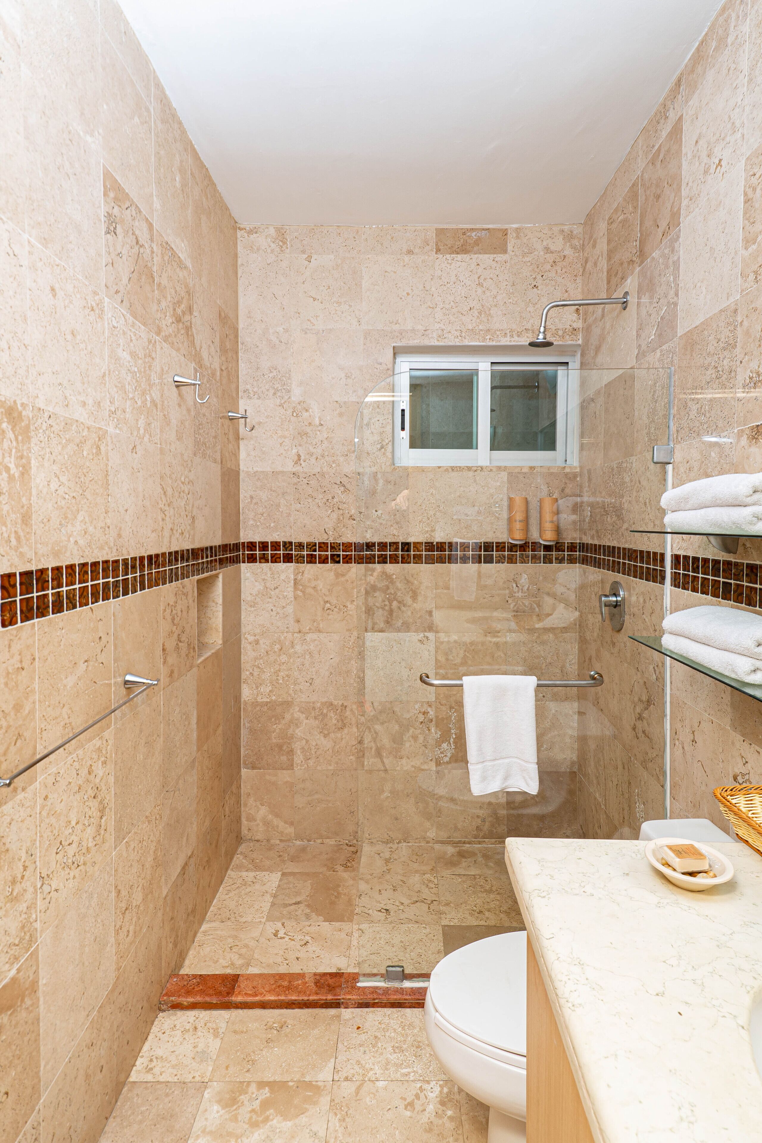 shower, free toiletries, hair dryer, towels