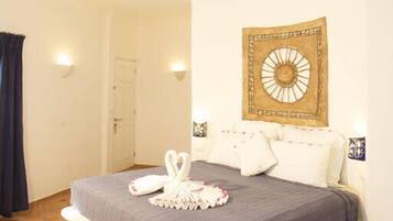 Superior Suite, 1 King Bed, Terrace | In-room safe, desk, iron/ironing board, free cribs/infant beds