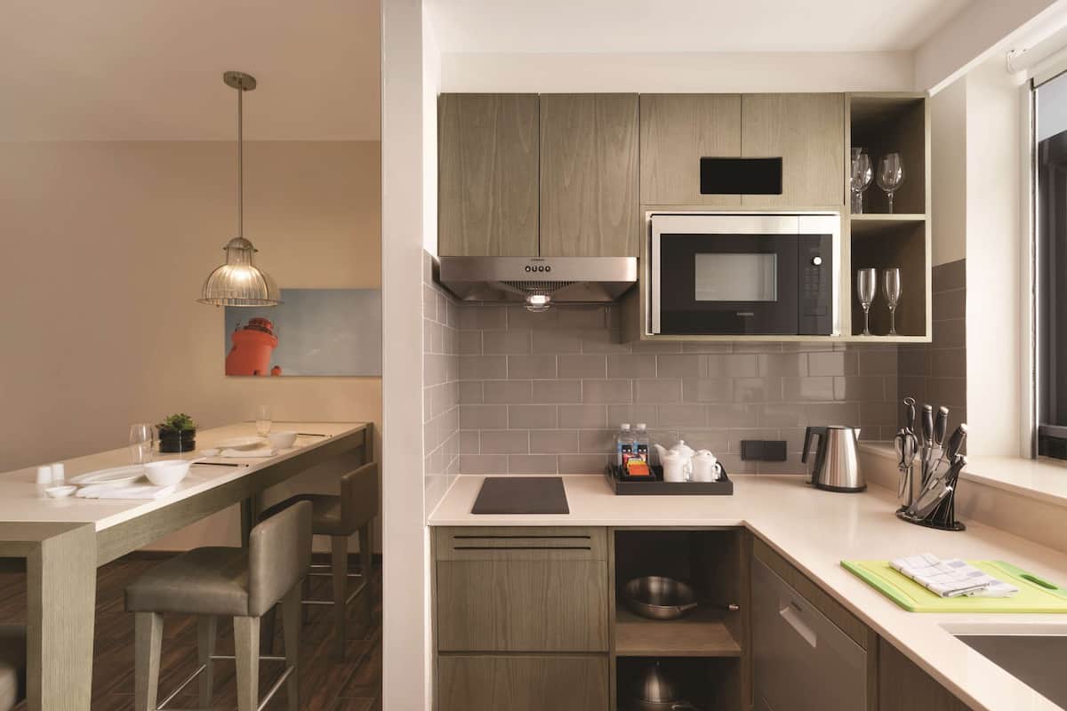 studio suite, 1 king bed with sofa bed, kitchenette | 1 bedroom, pillow-top beds, in-room safe, desk