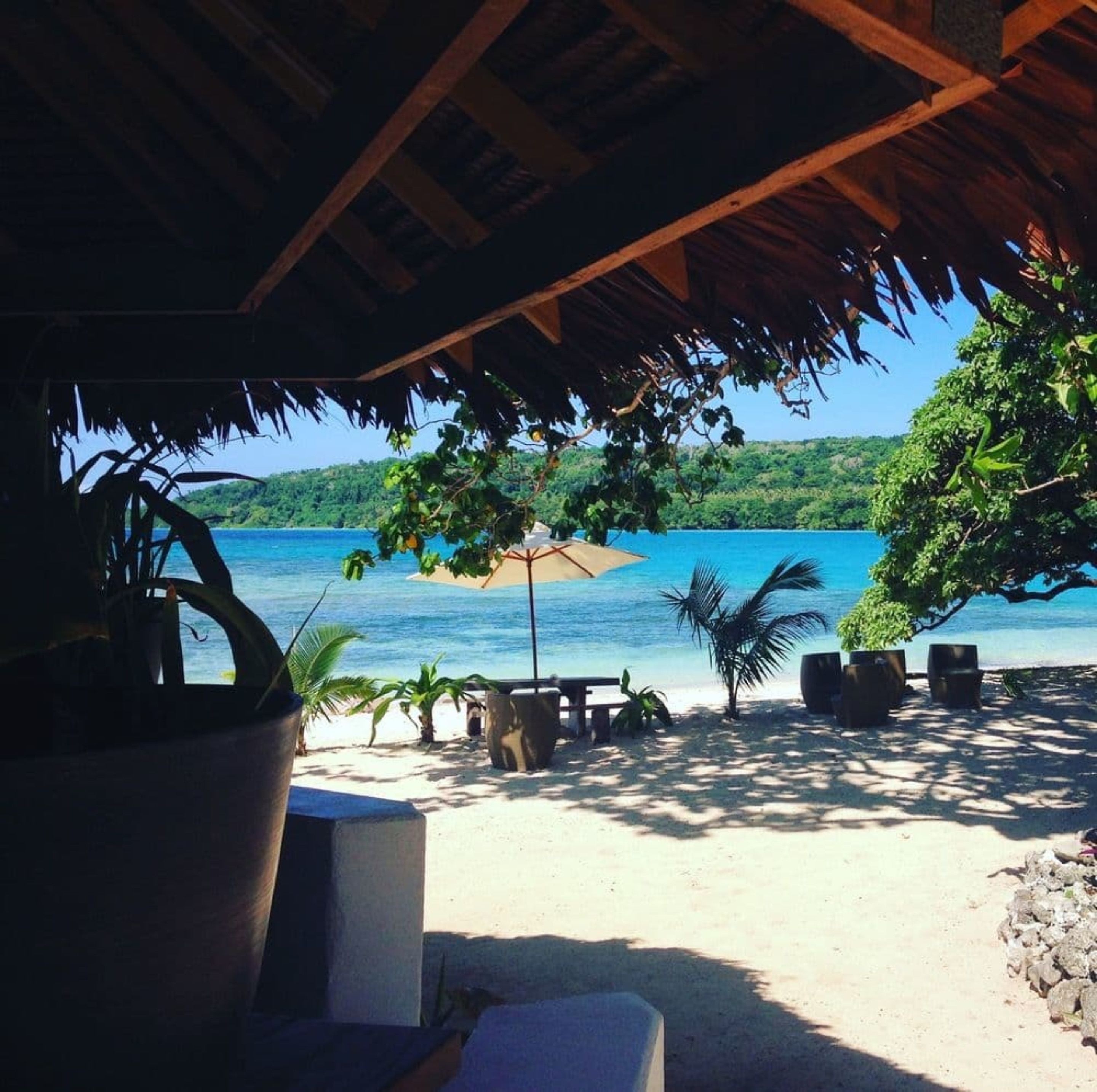 Private beach, white sand, sun loungers, beach umbrellas