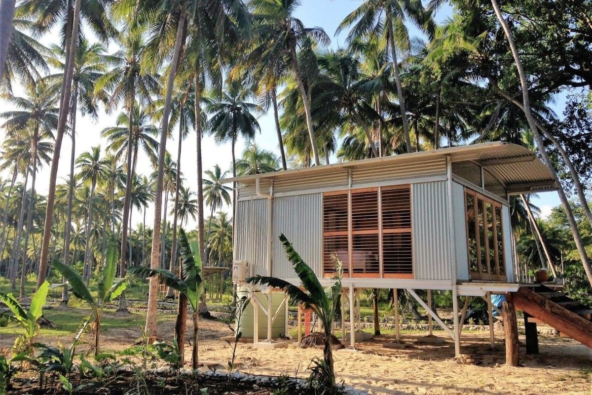 deluxe cabin, beach view, beachfront | premium bedding, desk, free wifi, bed sheets