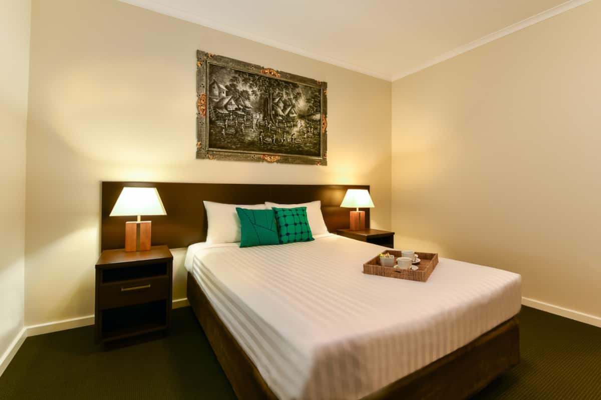 deluxe queen room | laptop workspace, blackout curtains, iron/ironing board, free wifi