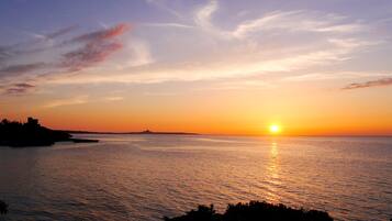 Beach nearby, white sand, beach massages