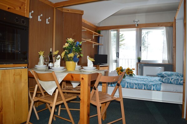 Apartment, 1 Bedroom (bilocale, 4 people) | Down comforters, blackout drapes, cribs/infant beds, bed sheets