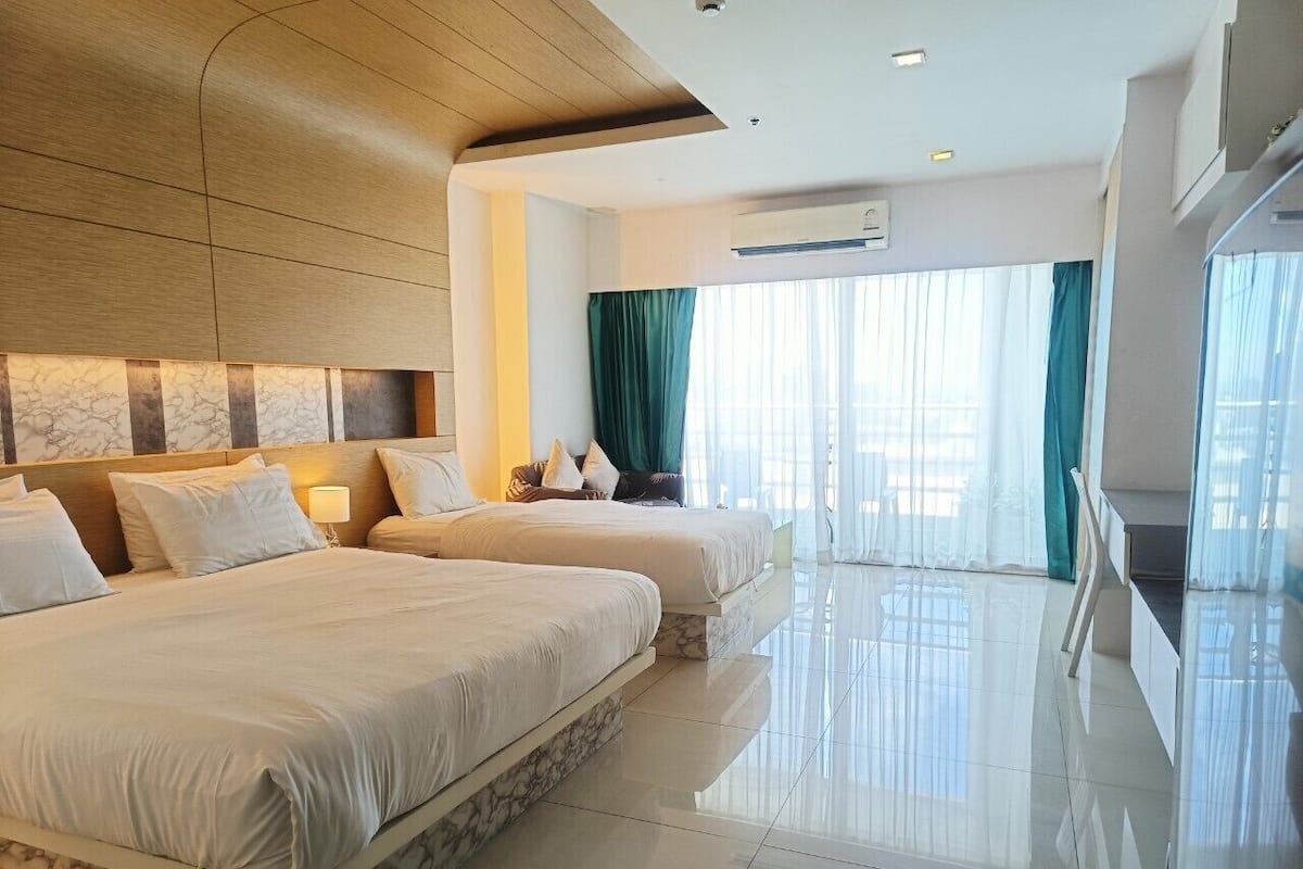 Triple Room, Kitchenette, Partial Ocean View | 1 bedroom, in-room safe, soundproofing, free WiFi