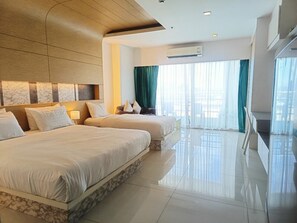 Triple Room, Kitchenette, Partial Ocean View | In-room safe, soundproofing, free WiFi, bed sheets - View Talay 6 Condominium by Honey (Pattaya)