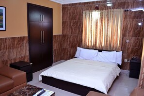 Chambre exécutive | Literie de qualité, rideaux d’obscurcissement, lits d’appoint