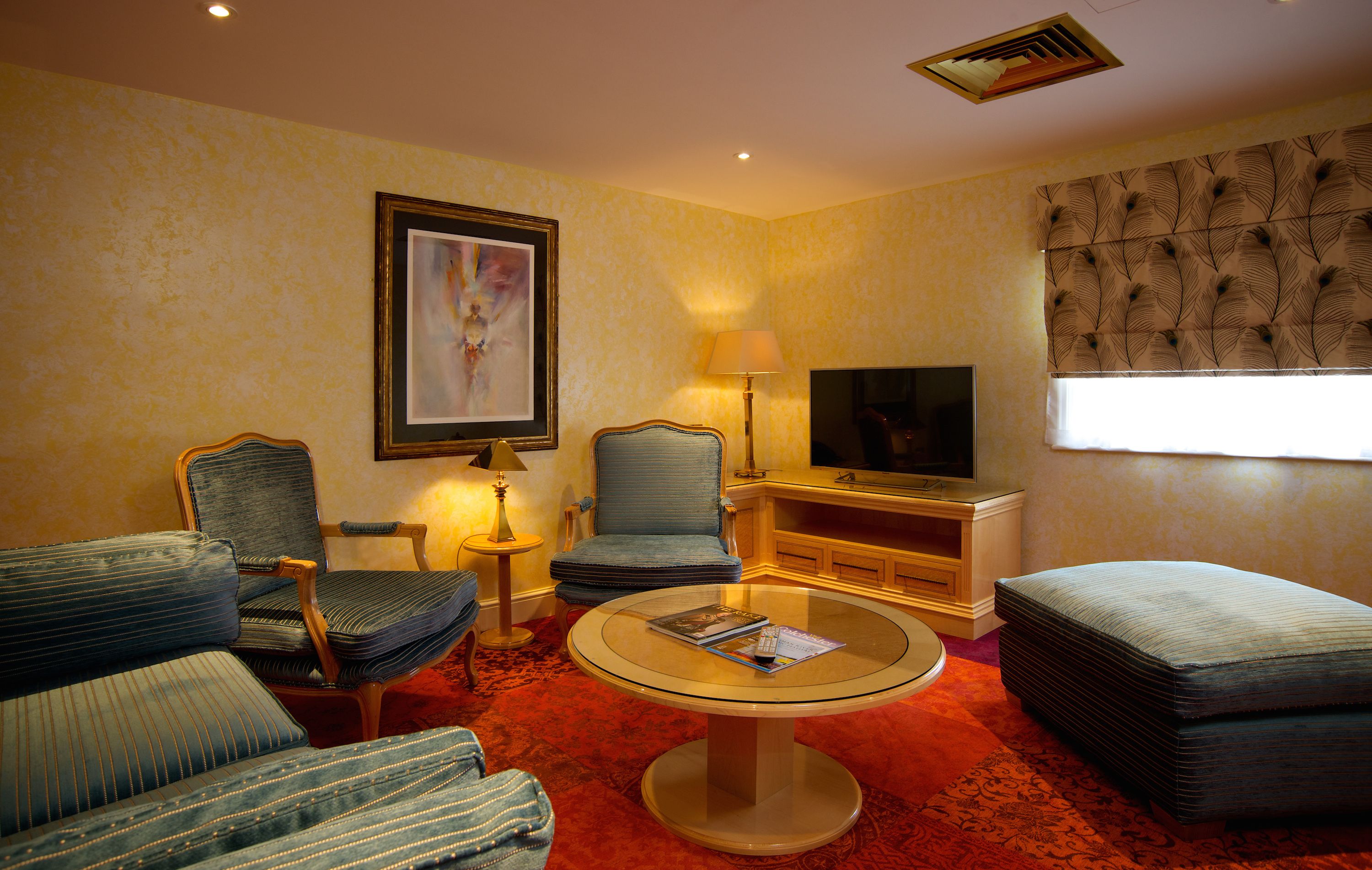 signature suite | living area | flat-screen tv