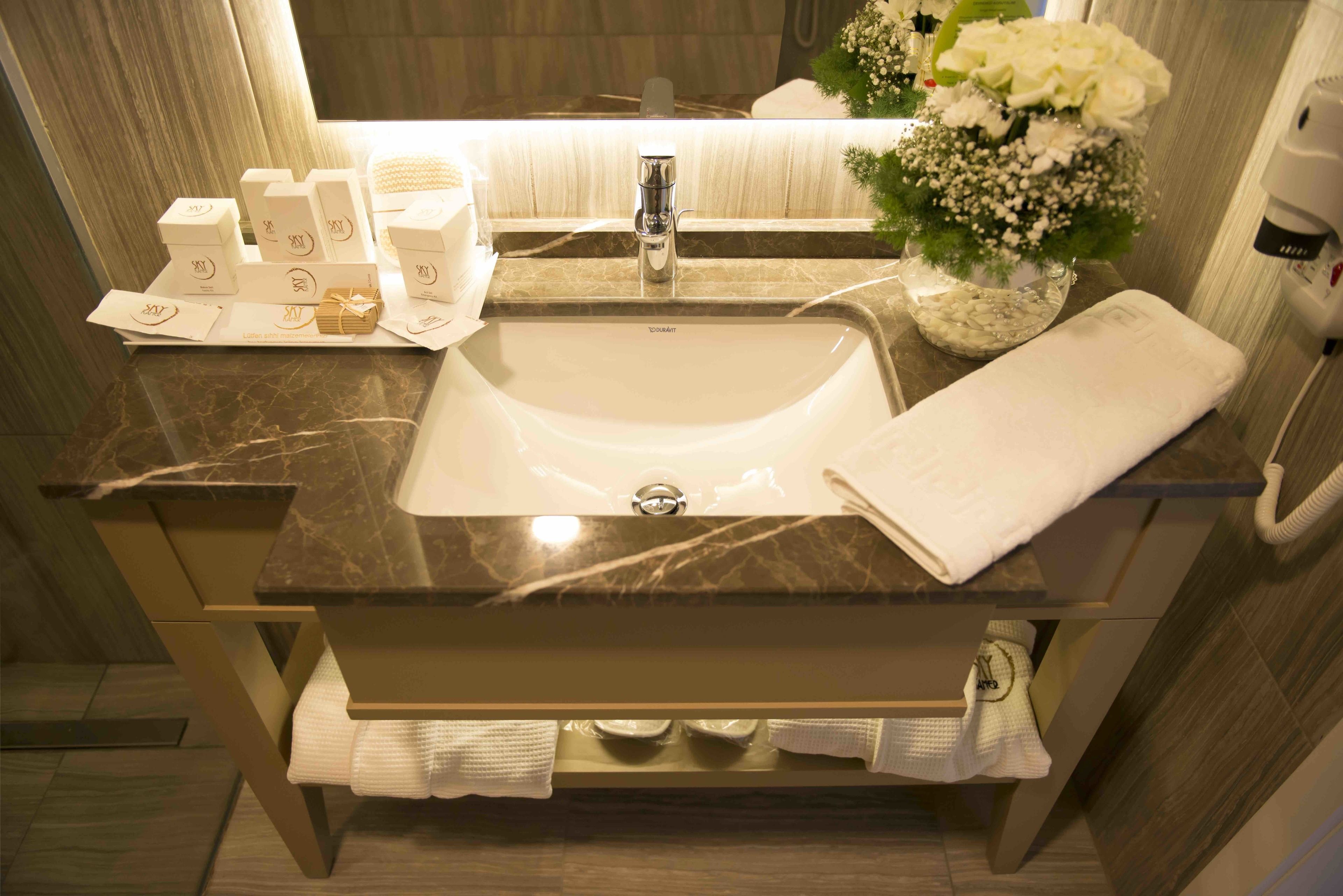 shower, rainfall showerhead, designer toiletries, hair dryer