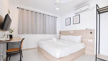 Kahden hengen deluxe-huone (yksi tai kaksi sänkyä), tupakointi kielletty, näköala puutarhaan | Minibaari, tallelokero huoneessa, työpöytä