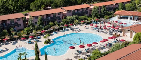 2 outdoor pools, pool umbrellas, sun loungers