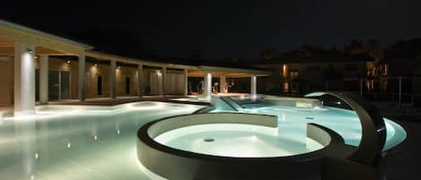 2 outdoor pools, pool umbrellas, pool loungers