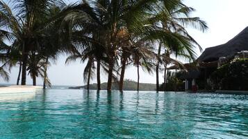 2 outdoor pools, pool umbrellas, sun loungers